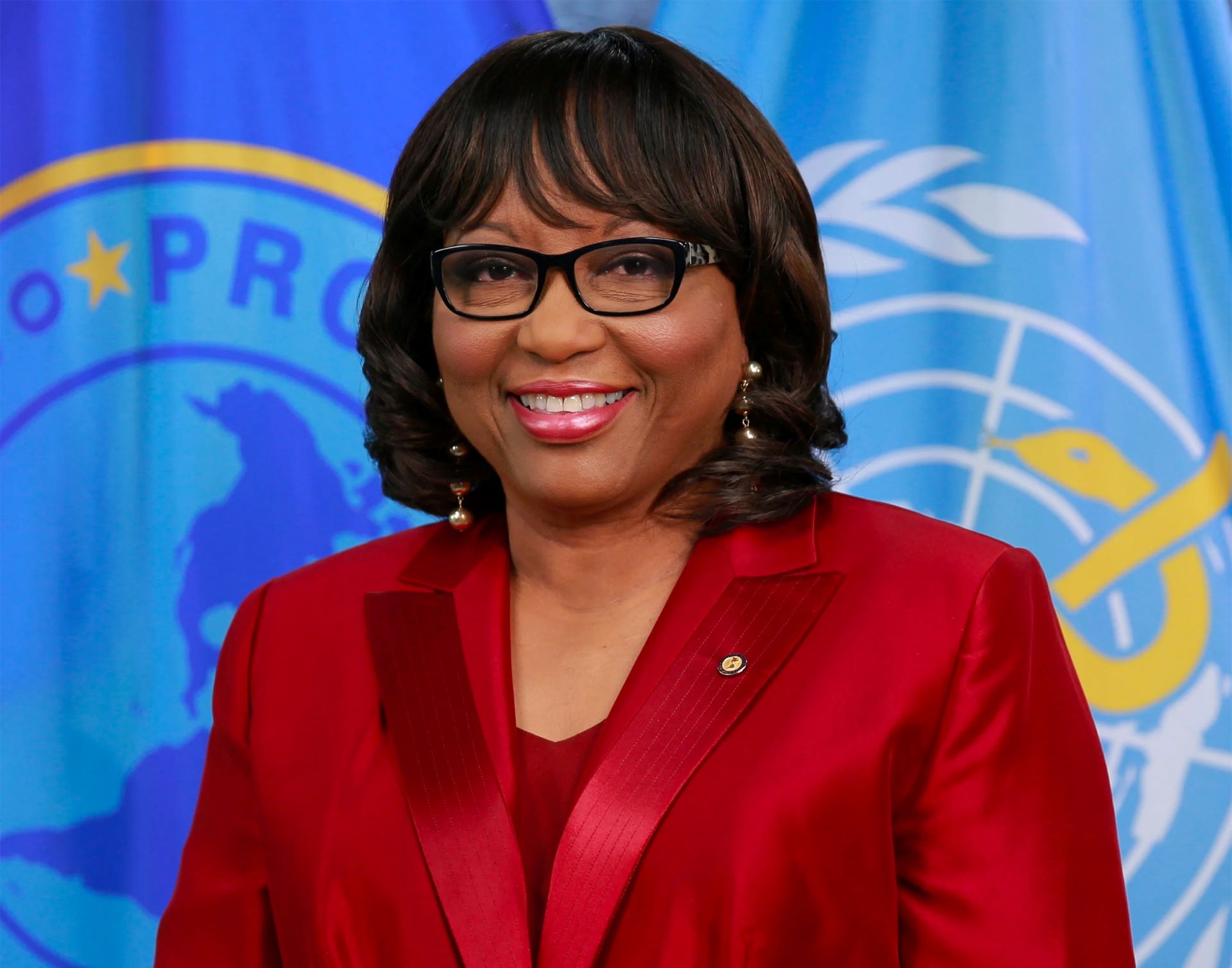 Portrait photo of Dr Carissa Etienne